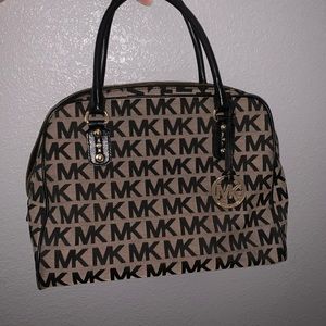 Micheal Kors black & nude gently used handbag